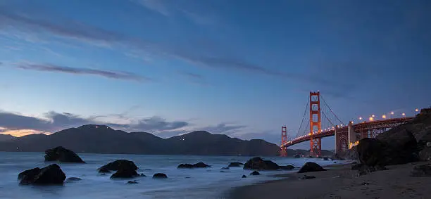 Photo of Golden-Gate Bridge at Dusk. Marshall's Beach, San Francisco