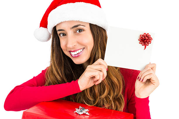 istock Chritsmas woman showing text space 492522552
