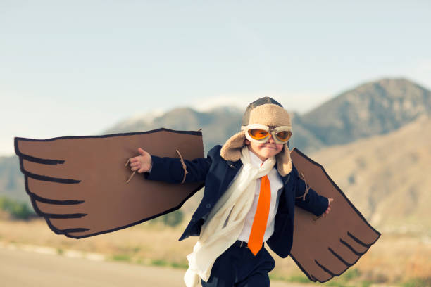 istock Young Boy Businessman Dressed as Pliot Flies 492527765