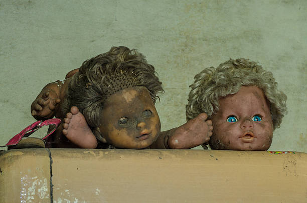istock heads of two dolls 492527791
