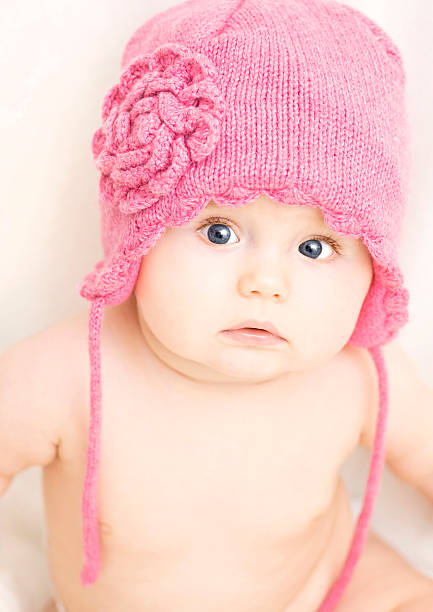 Little girl in pink hat. stock photo