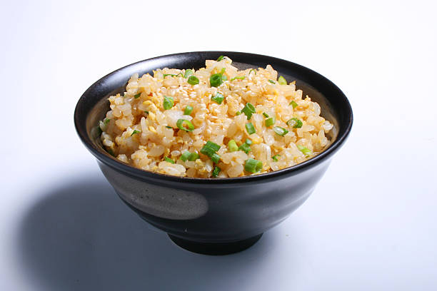 istock Garic fried with rice japan food isolated on white background 492528877