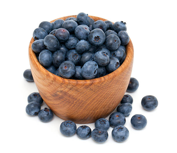 istock blueberries in a wooden bowl 492529023