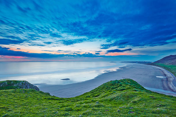 Rhossili bay Rhossili bay at sunset rhossili bay stock pictures, royalty-free photos & images