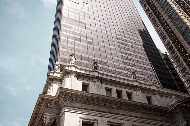 istock Statues Atop New York City Office Building 492529067