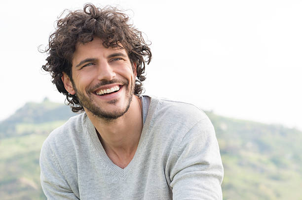 Portrait Of Happy Laughing Man Portrait Of Young Handsome Man Smiling Outdoor toothy smile stock pictures, royalty-free photos & images