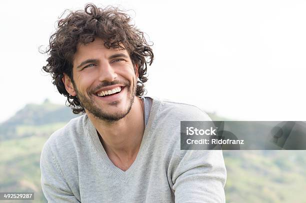 Portrait Of Happy Laughing Man Stock Photo - Download Image Now - Men, Smiling, Young Men