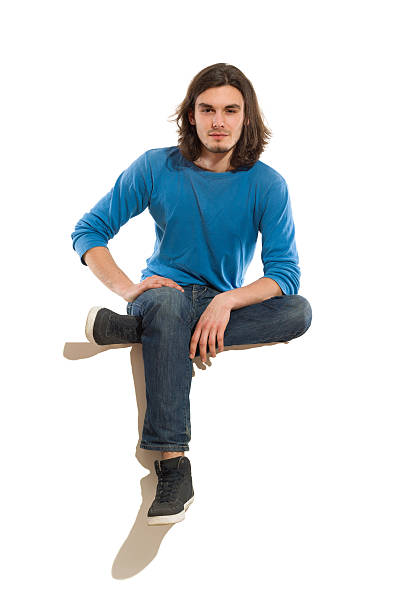istock Handsome man sitting on a banner 492529745