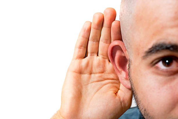 理解していない - listening human ear communication human hand ストックフォトと画像