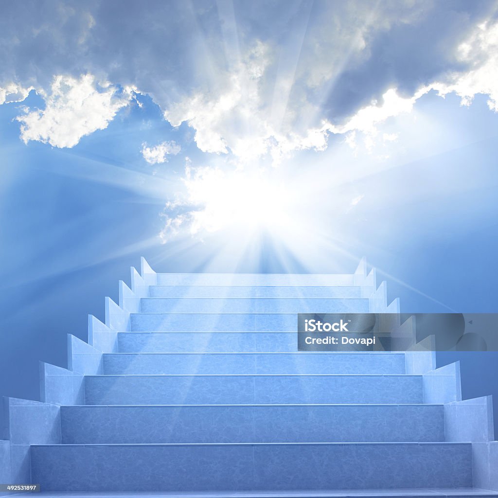 Stairs in the sky Stairs in sky. Concept with staircase, sun, white clouds and blue background Heaven Stock Photo