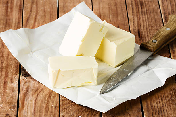 istock Still life butter on wooden background 492532991