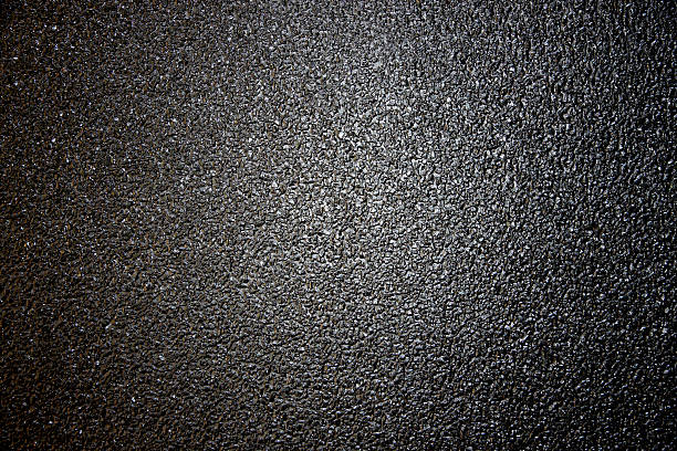 istock dark color of asphalt road surface. 492533473