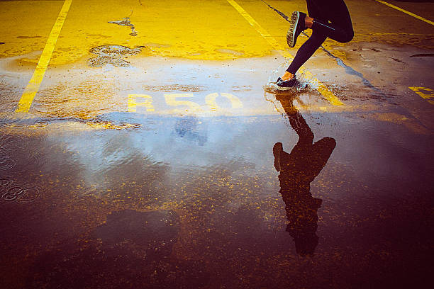istock Young person running over the parking lot 492536990