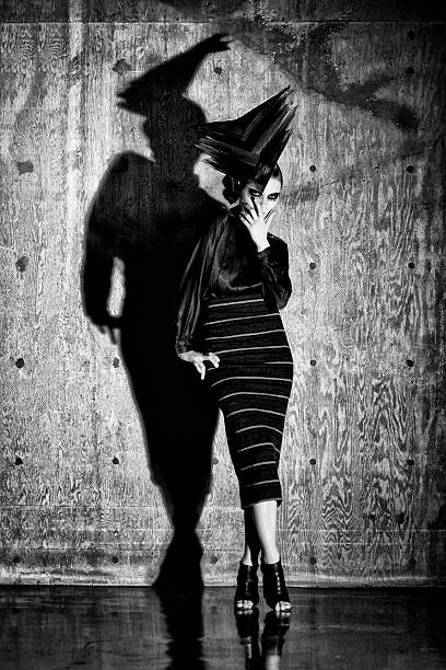 istock High Fashion Model Standing in Front of Wall 492538168