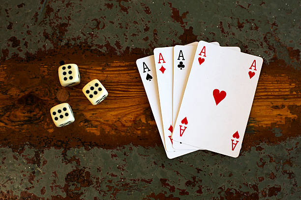 istock cards '4 aces' and dice 492538684