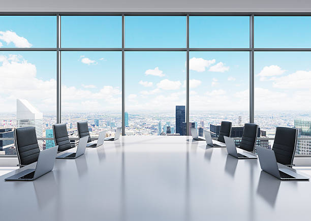istock room equipped by laptops in a panoramic office 492539288