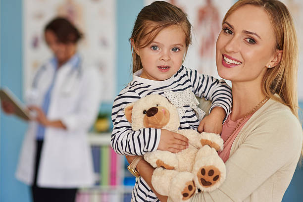 istock Little brave patient with her toy 492540530