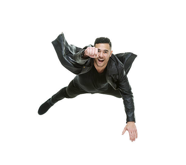 istock Cheerful casual man flying 492540850