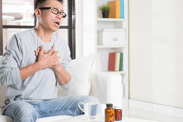 istock Mature Asian man heart attack 492541694