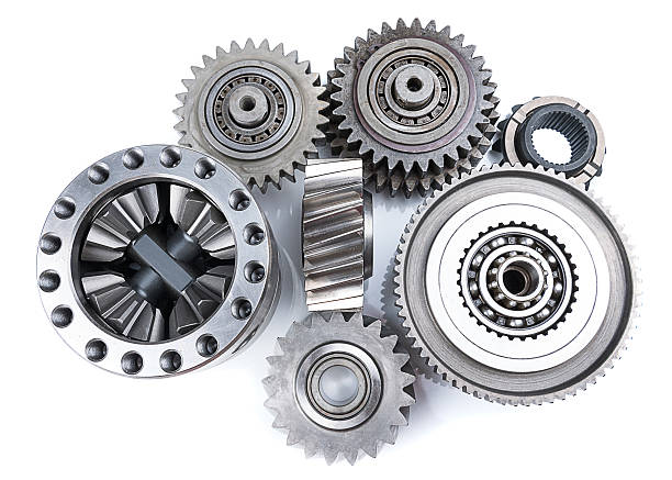 istock Cog wheels, gears, machine teeth and transmission on isolated background 492542664