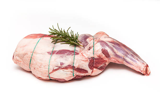 Leg of lamb isolated on a white studio background.