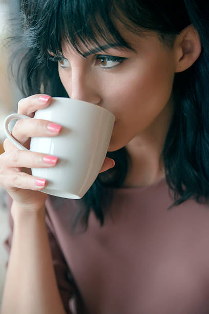 istock Young Woman, Drinking Tea or Coffee 492544068
