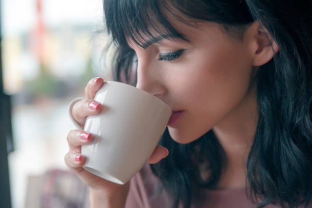 istock Portrait of happy brunette, Drinking Tea or Coffee 492544448