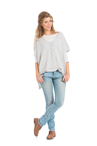 istock Happy Young Woman Standing 492544791