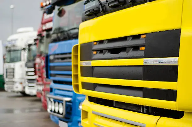 Some colorful parked trucks