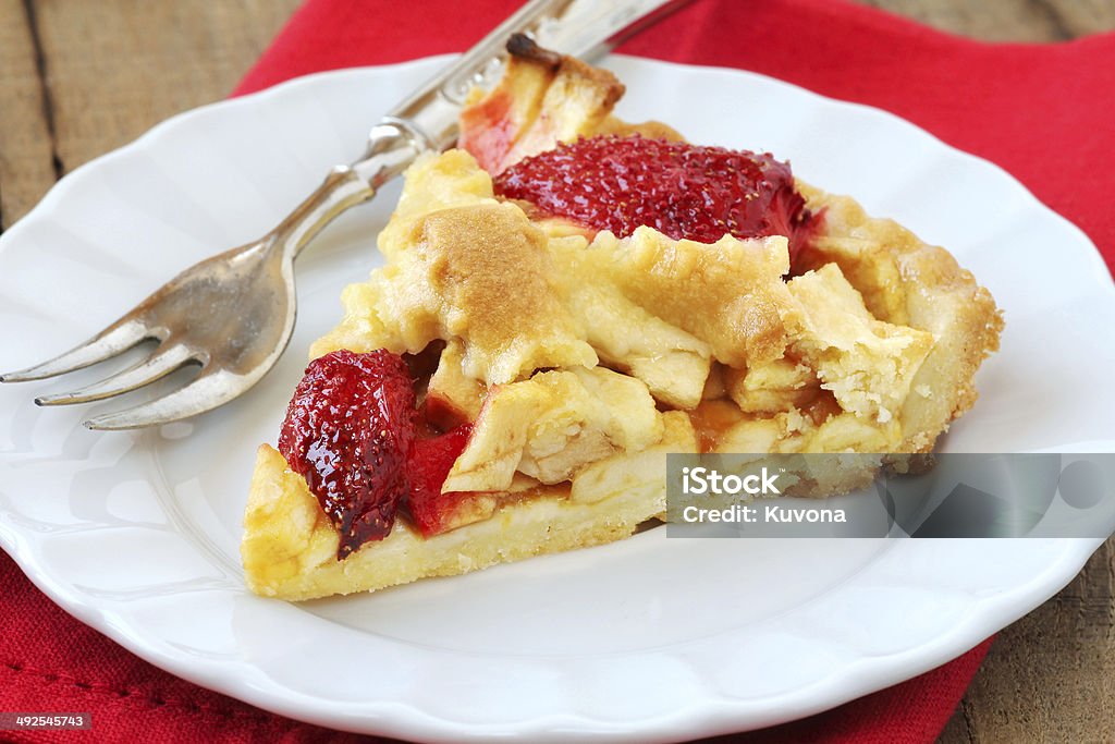 Homemade apple and strawberry tart Delicious homemade apple and strawberry tart pie Apple - Fruit Stock Photo