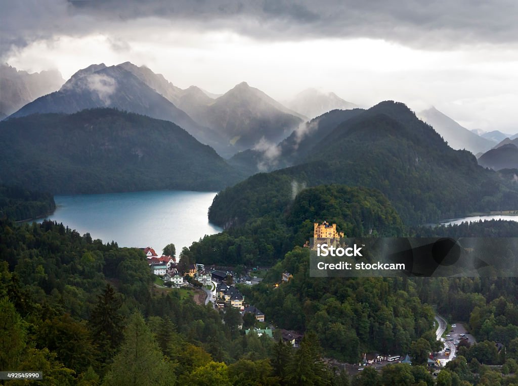 Lake Alpsee and Hohenschwangau Castle View from Neuschwanstein castle onto lake Alpsee and Hohenschwangau castle. Bavaria, Germany. Neuschwanstein Castle Stock Photo