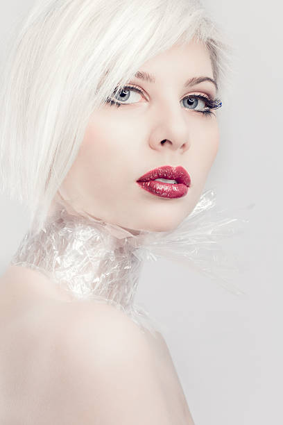 istock Blonde model girl in plastic 492547075