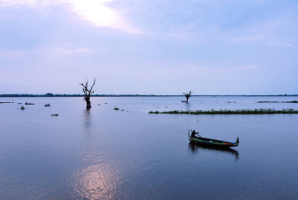 istock Sunset from Amarapura bridge, Myanmar. 492547857