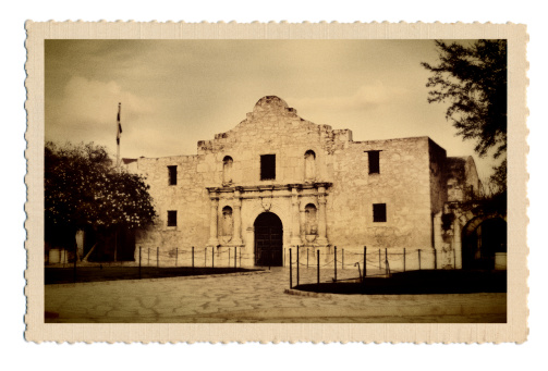 A retro postcard of the Alamo memorial, San Antonio, Texas, USA. The image on the postcard is an original photograph produced for this stock photo, it is not a scan copy of an actual postcard image.