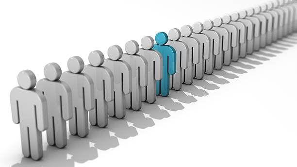 istock Single turquoise 3D people figure in row of white figures. 492548300