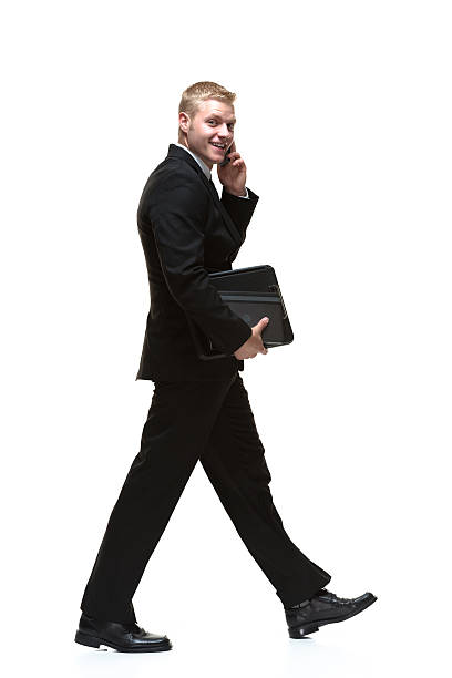 istock Smiling businessman talking on mobile 492549180