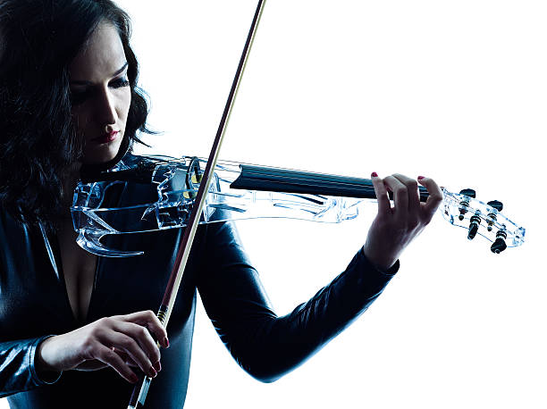 istock Violinist woman slihouette isolated 492550254