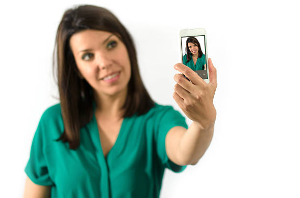 Women in green Selfie stock photo