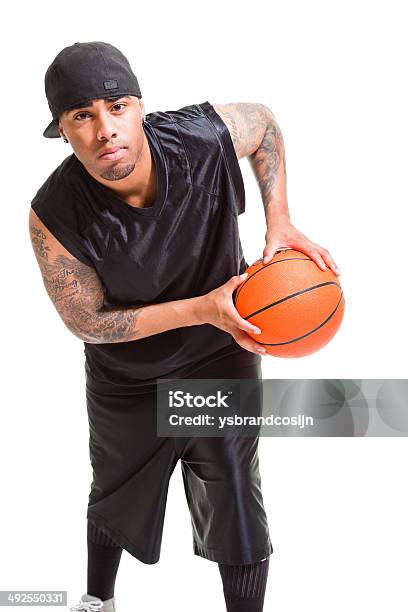 Studio Portrait Of Basketball Player Wearing White Cap Stock Photo - Download Image Now