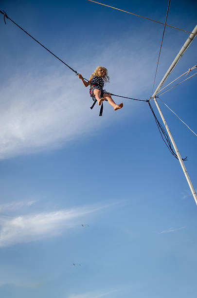 istock brave jumping high up in skies 492550770