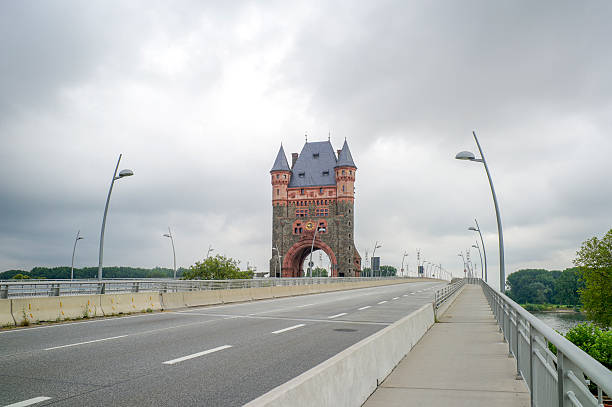 Tower of old bridge in worms over rhein river at germany