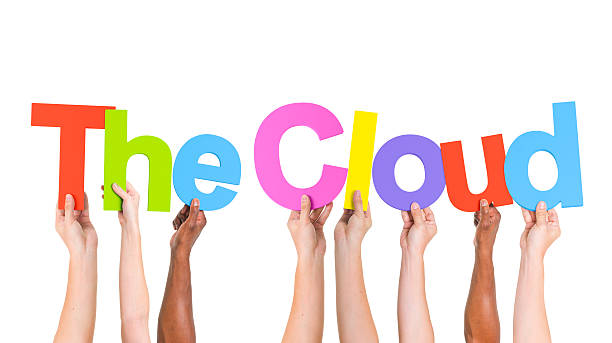 istock Multiethnic Arms Raised Holding Texts The Cloud 492569127
