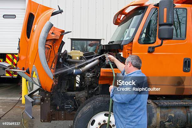 Mechanic Washes Truck Before Servicing Stock Photo - Download Image Now - Diesel Fuel, Truck, Mechanic