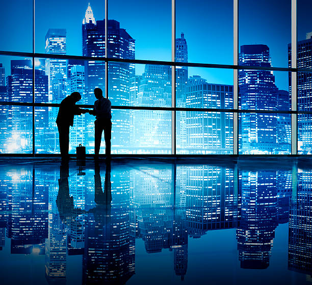 istock Two Businessmen Bonding In An Office Building 492570289