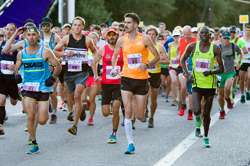 Manitou Springs, Colorado, USA - August 15, 2015: Runners start the rugged Pikes Peak Ascent race up 14,115 foot Pikes Peak on the Barr Trail near Manitou Avenue in Manitou Springs Colorado