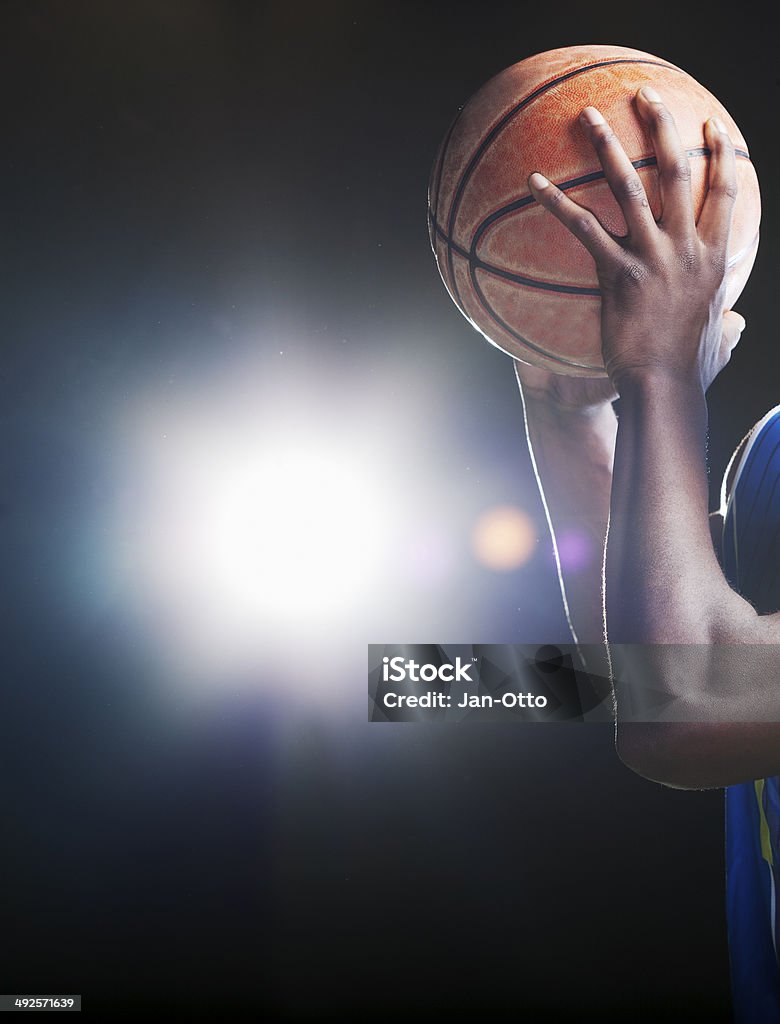 Basktball and hands Close up of a basketball player, holding a ball.  Basketball - Ball Stock Photo