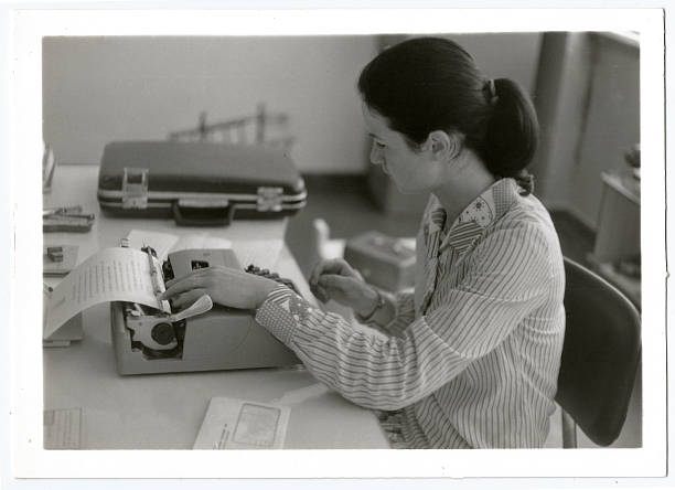 istock Young 1970s woman working 492572333