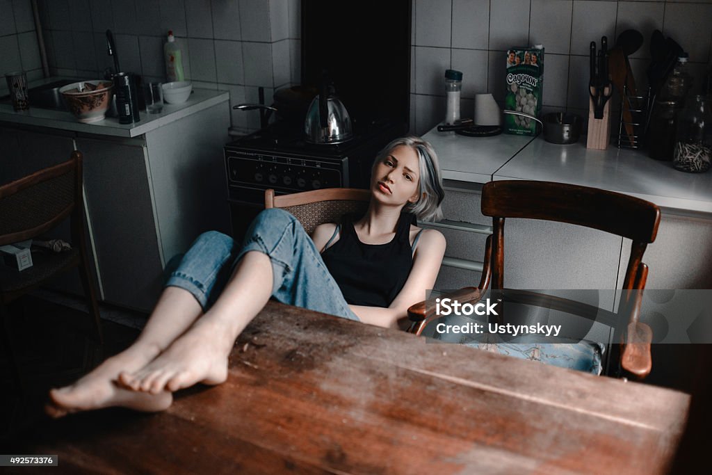 beautiful girl in kitchen beautiful girl in sitting in the kitchen 2015 Stock Photo