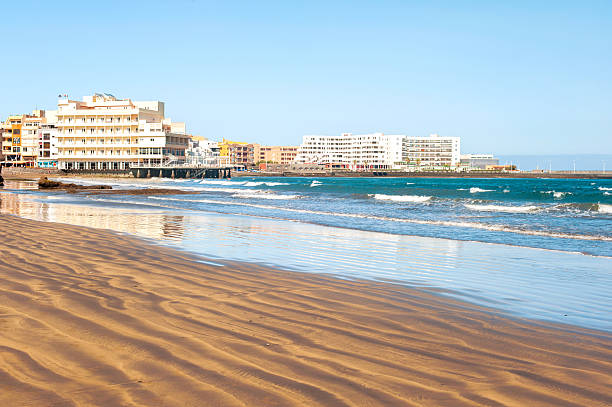 istock Atlantic ocean beach with hotels on the coast. Panoramic view. 492575050