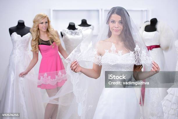 Buying Wedding Dress Stock Photo - Download Image Now - Adult, Assistance, Bride